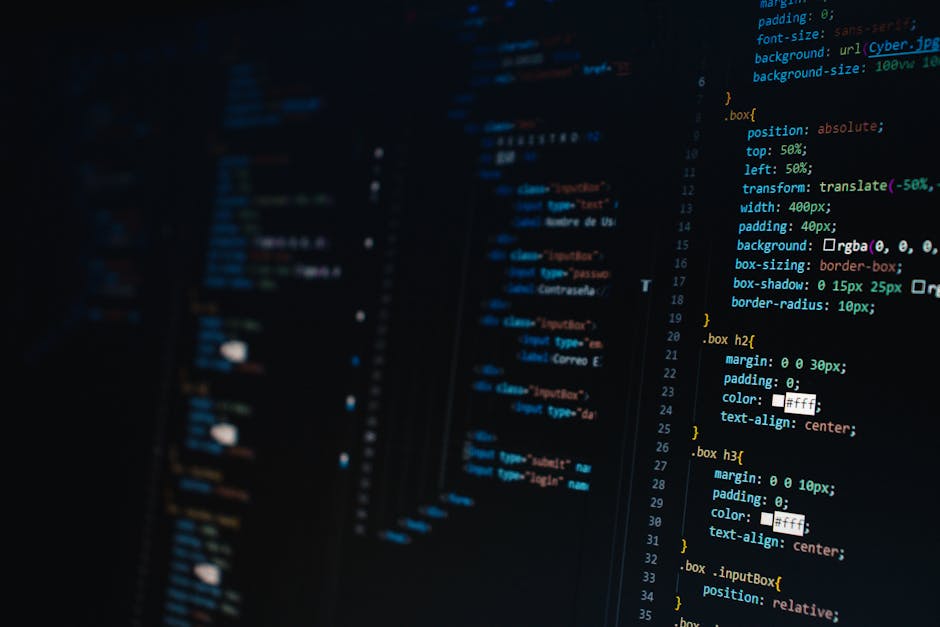A detailed close-up of a computer screen displaying a coding interface with lines of HTML and CSS code highlighted in various colors including blue, orange, and white. The code includes style definiti